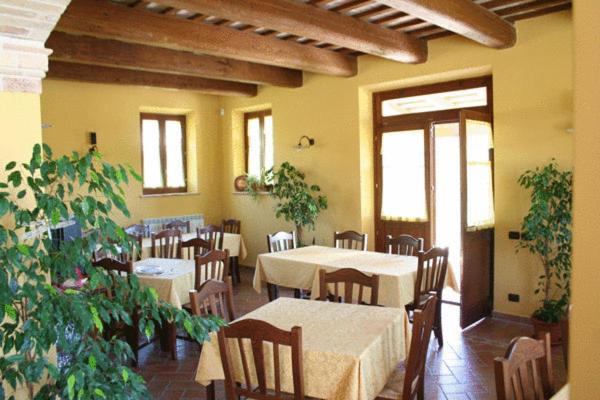 Reštaurácia alebo iné gastronomické zariadenie v ubytovaní Agriturismo La Cicala