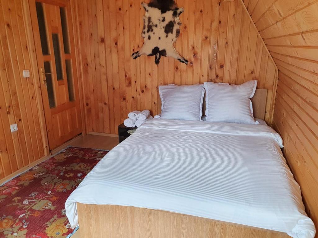 Postel nebo postele na pokoji v ubytování Casa Dor de Ea