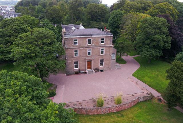 an aerial view of a large house with a yard at Morven Guest House Carnoustie in Carnoustie