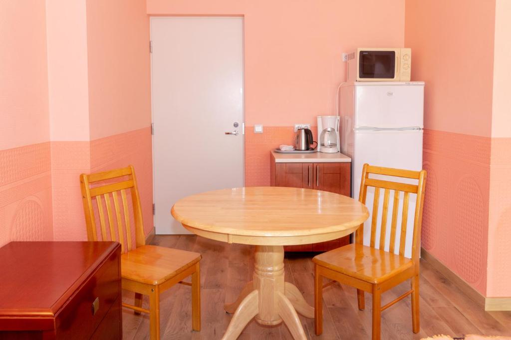 Kuchyň nebo kuchyňský kout v ubytování Fortuna Apartments