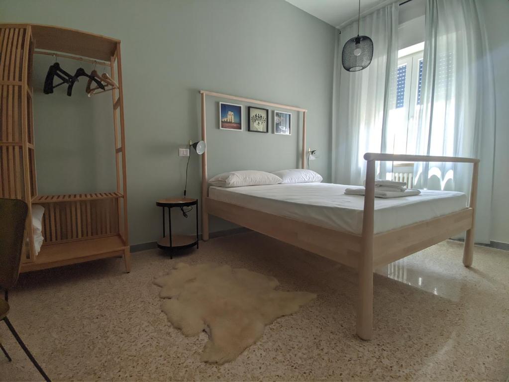 Postel nebo postele na pokoji v ubytování Terra di Sud Rooms
