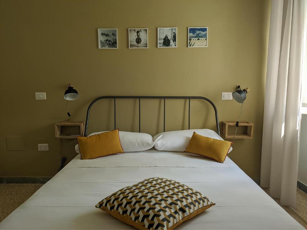 Postel nebo postele na pokoji v ubytování Terra di Sud Rooms