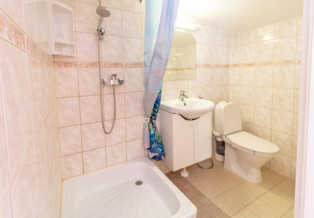 Koupelna v ubytování Fortuna Apartments