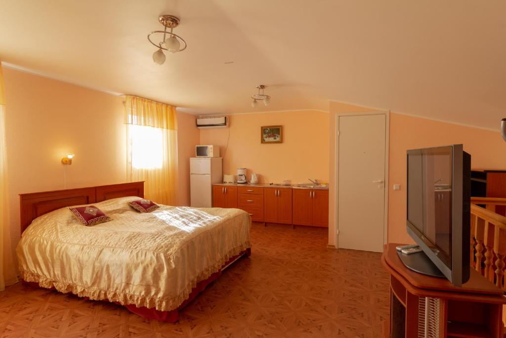 Postel nebo postele na pokoji v ubytování Fortuna Apartments