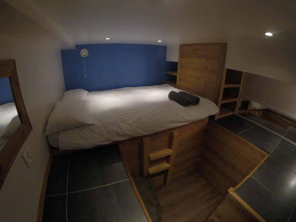 Postel nebo postele na pokoji v ubytování Chamonix Lodge