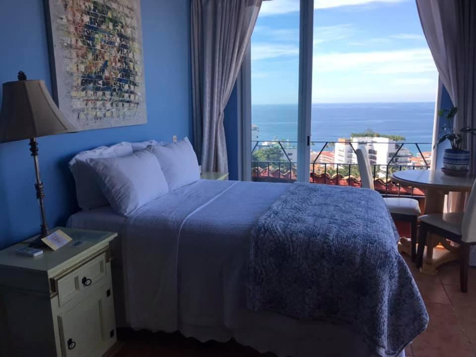 Postel nebo postele na pokoji v ubytování Casa Isabel a Boutique Hilltop Inn