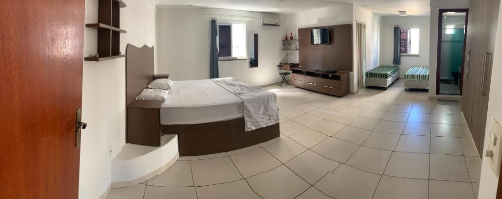 Postel nebo postele na pokoji v ubytování Porto das Palmeiras Hostel