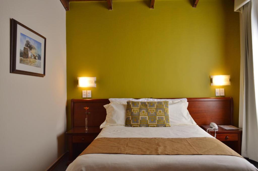 Postel nebo postele na pokoji v ubytování La Carolina Inn