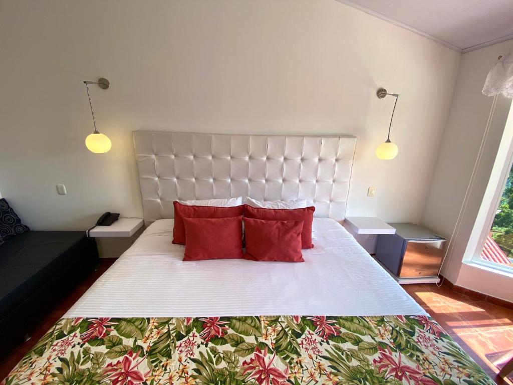 Cama o camas de una habitación en Hotel El Mirador del Cocora
