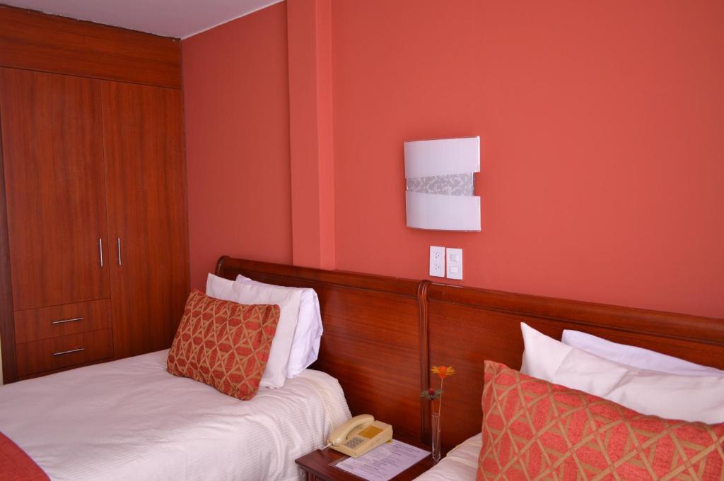 Postel nebo postele na pokoji v ubytování La Carolina Inn