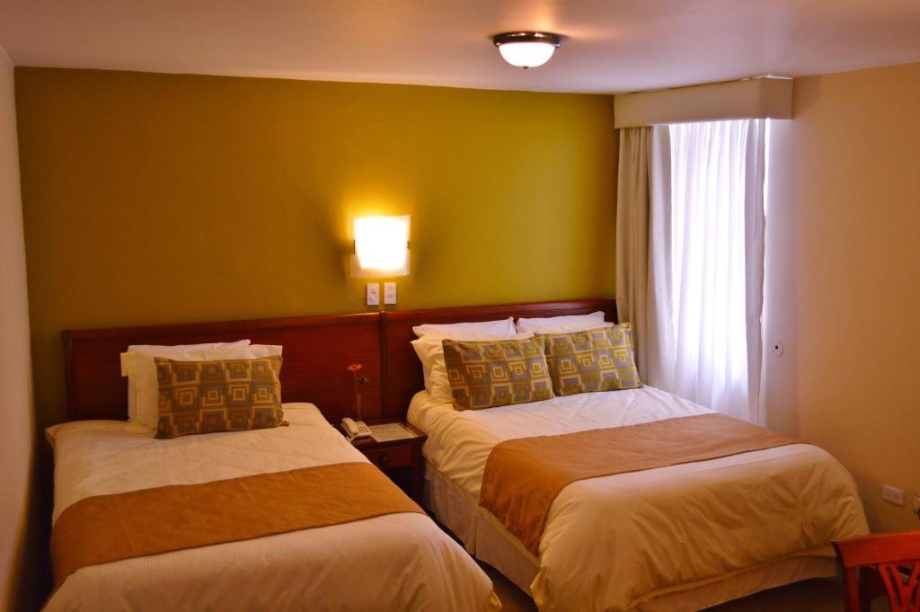 Postel nebo postele na pokoji v ubytování La Carolina Inn