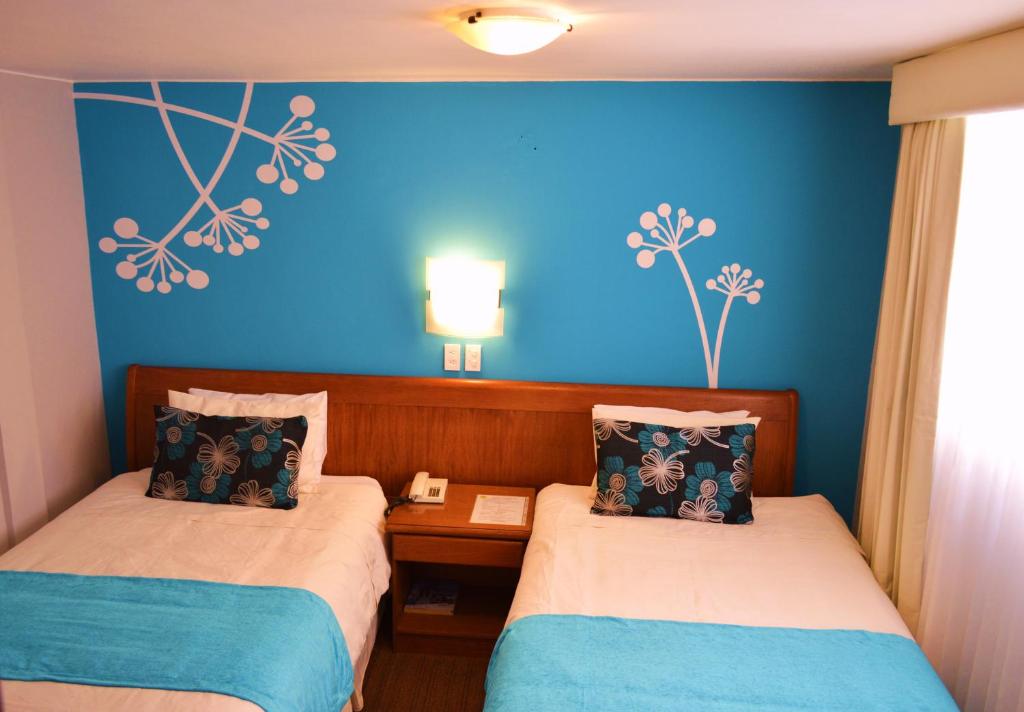 Postel nebo postele na pokoji v ubytování La Carolina Inn