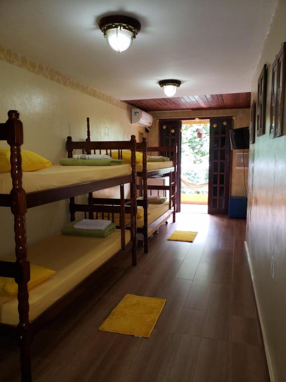 Postel nebo postele na pokoji v ubytování Paz e Amor Suite