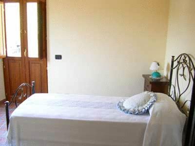 Posteľ alebo postele v izbe v ubytovaní Agriturismo La Cicala