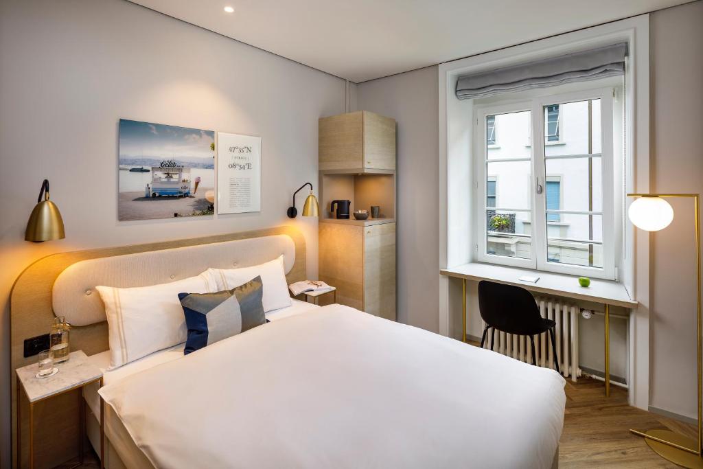 Llit o llits en una habitació de Hotel Felix