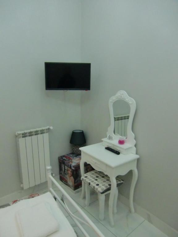Telewizja i/lub zestaw kina domowego w obiekcie Guesthouse Aaron2