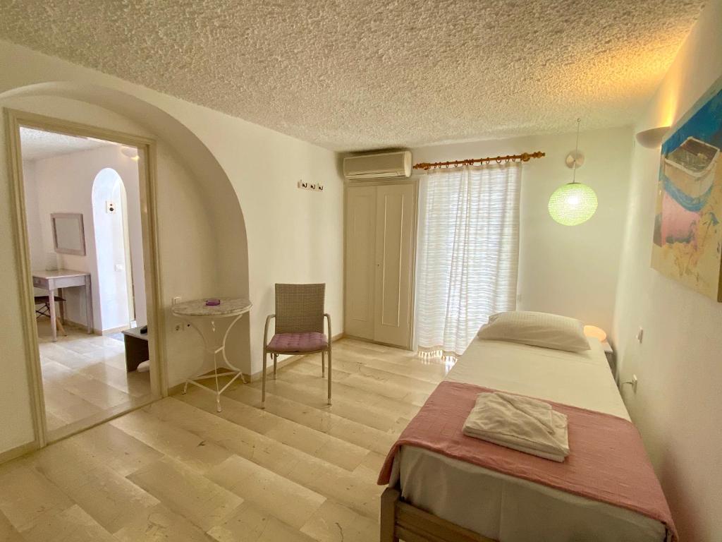 Posteľ alebo postele v izbe v ubytovaní Maria Elena - Suite Home