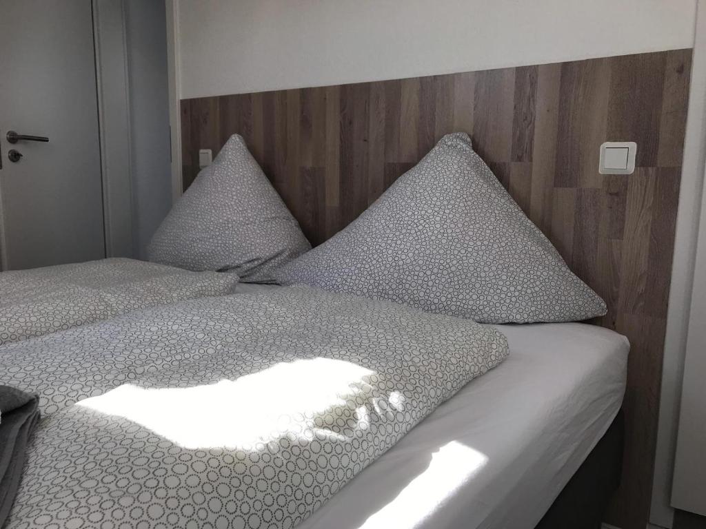 Postel nebo postele na pokoji v ubytování Wohnen am Wanderweg II