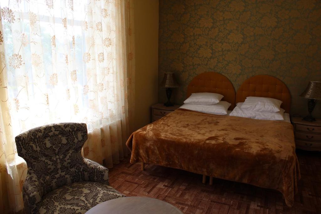 Postel nebo postele na pokoji v ubytování Villa & Restoran Soffa