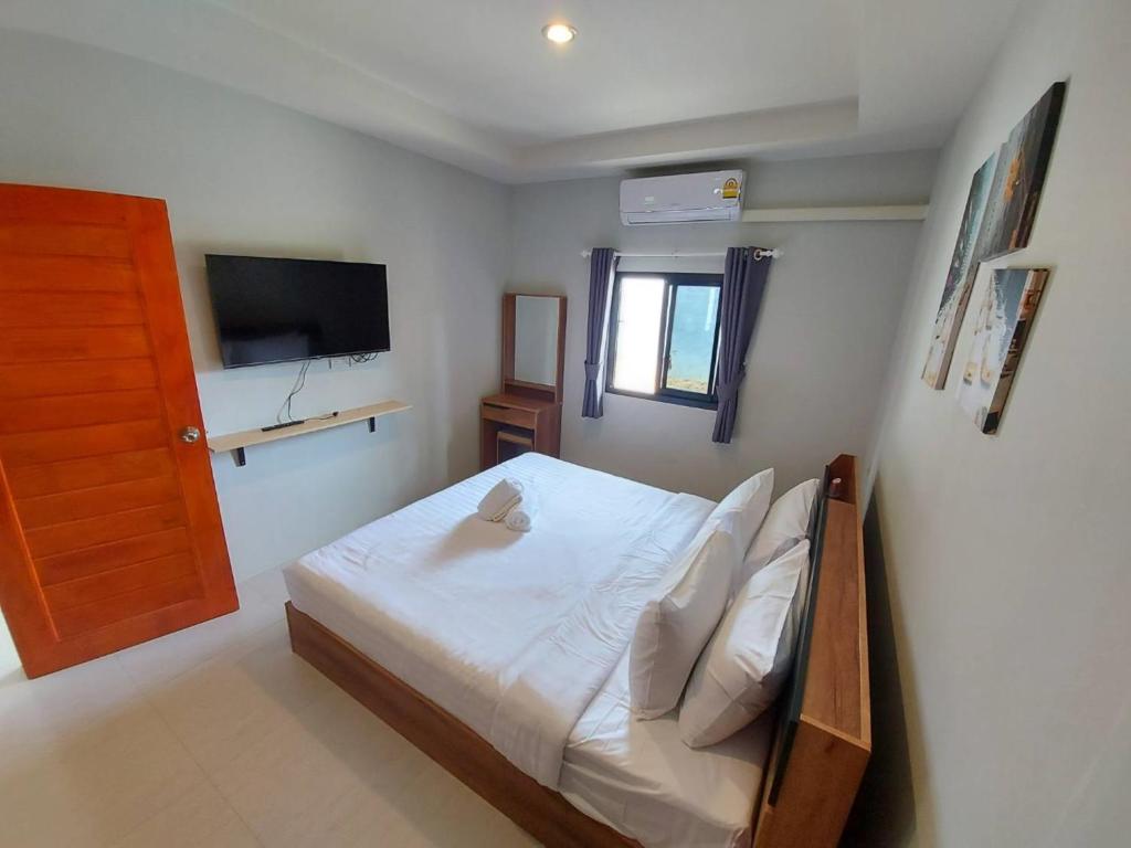 Postel nebo postele na pokoji v ubytování Malinee Resort