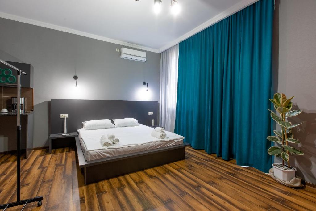Postel nebo postele na pokoji v ubytování 4 Rooms