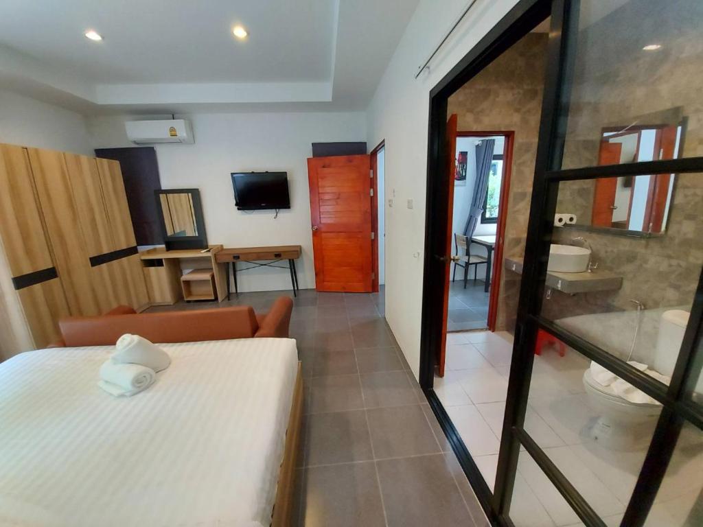 Postel nebo postele na pokoji v ubytování Malinee Resort