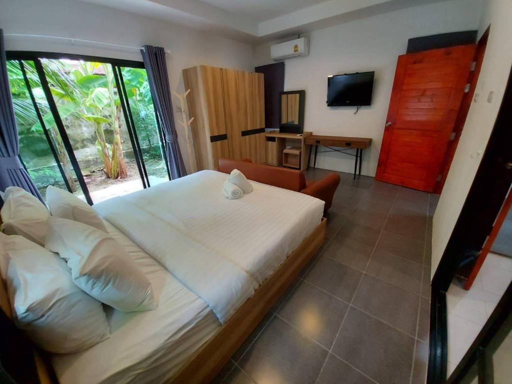 Postel nebo postele na pokoji v ubytování Malinee Resort