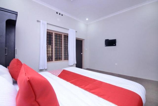 Postel nebo postele na pokoji v ubytování Wayal Wayanad Farm Resort