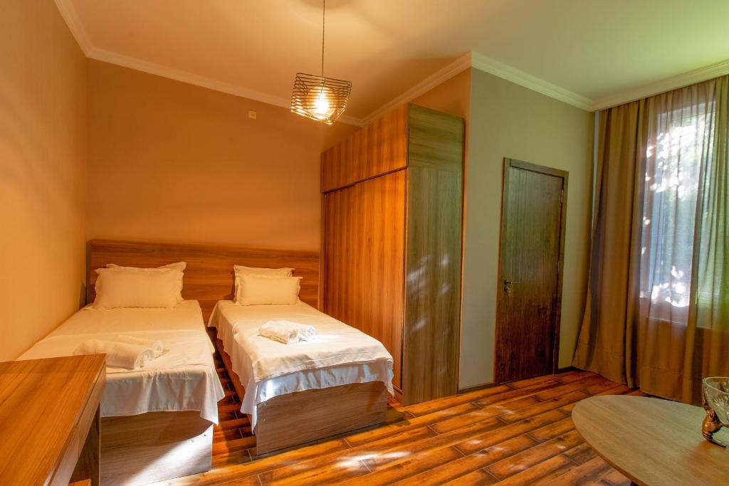 Postel nebo postele na pokoji v ubytování 4 Rooms