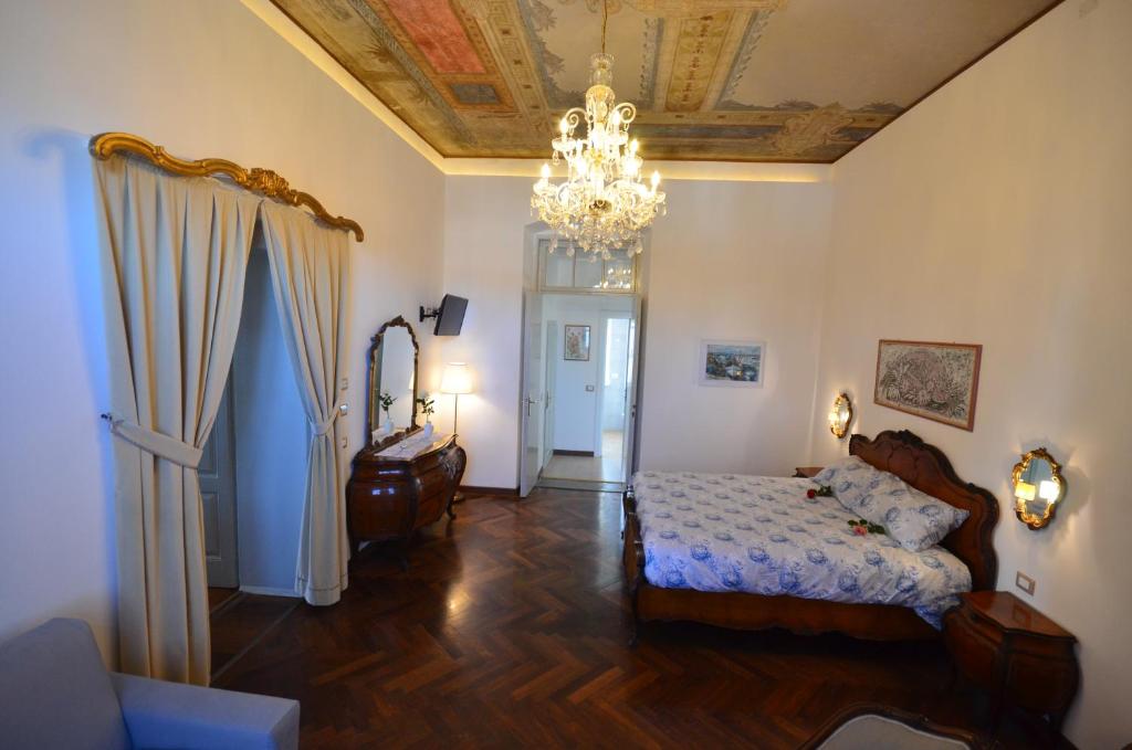 Postel nebo postele na pokoji v ubytování Al Castello di Aiello