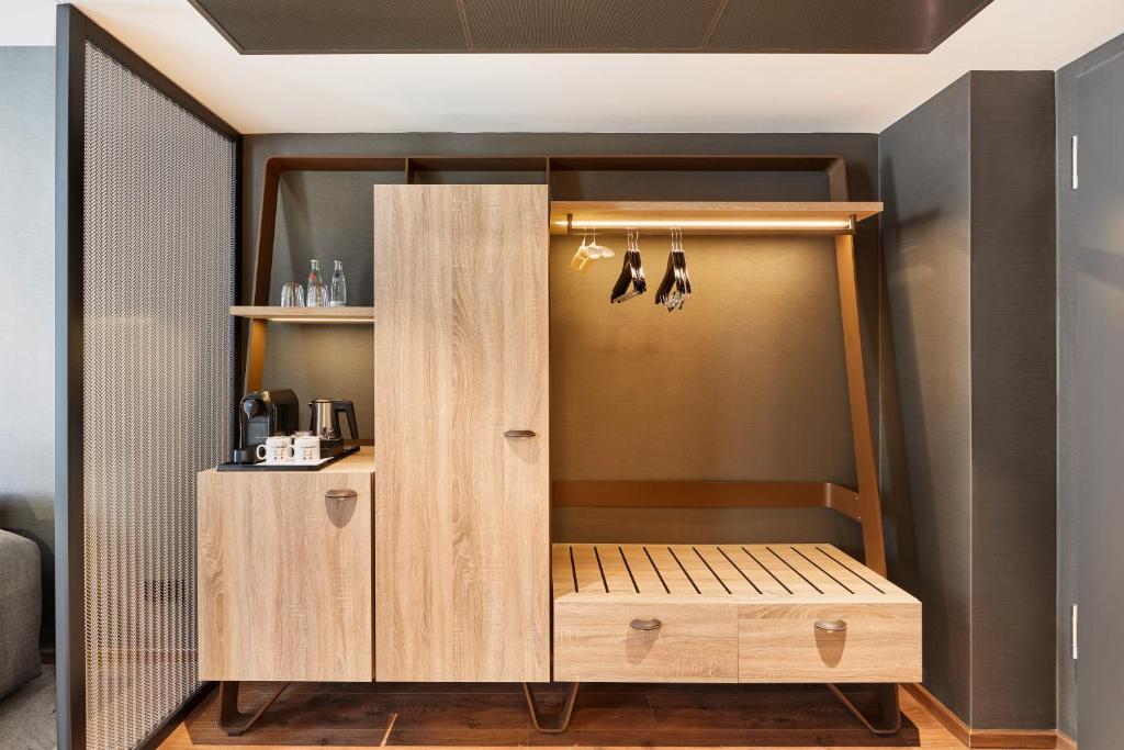 Postel nebo postele na pokoji v ubytování HYPERION Hotel Leipzig