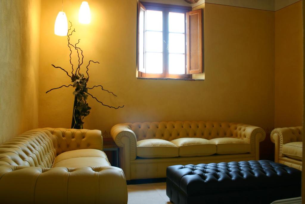 Posezení v ubytování Hotel Le Capanne