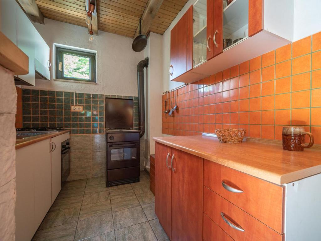 Kuchyňa alebo kuchynka v ubytovaní Holiday Home Legendao by Interhome