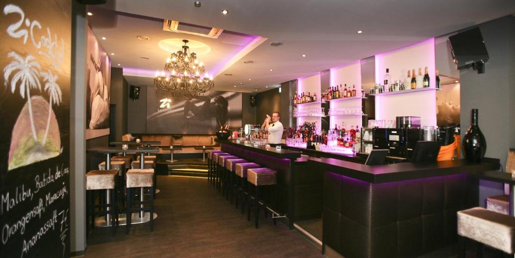 Lounge nebo bar v ubytování Karlstor Gästehaus