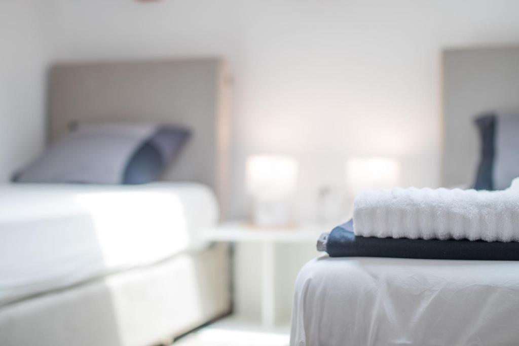 Postel nebo postele na pokoji v ubytování Apartmani Mario