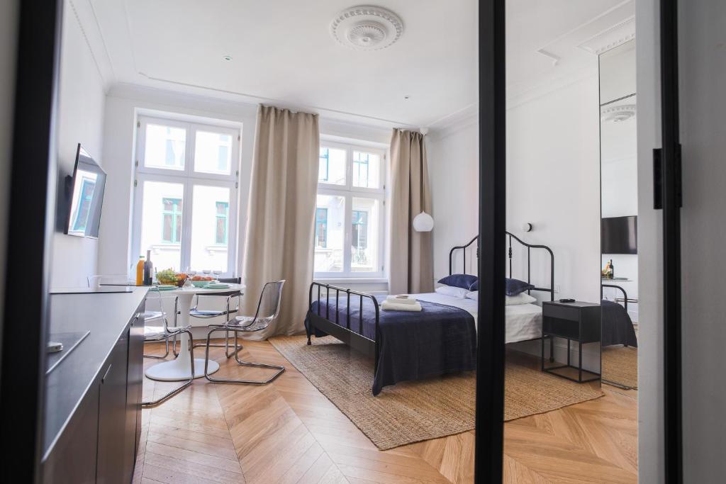 Posteľ alebo postele v izbe v ubytovaní Apartment Copernicus No. 25