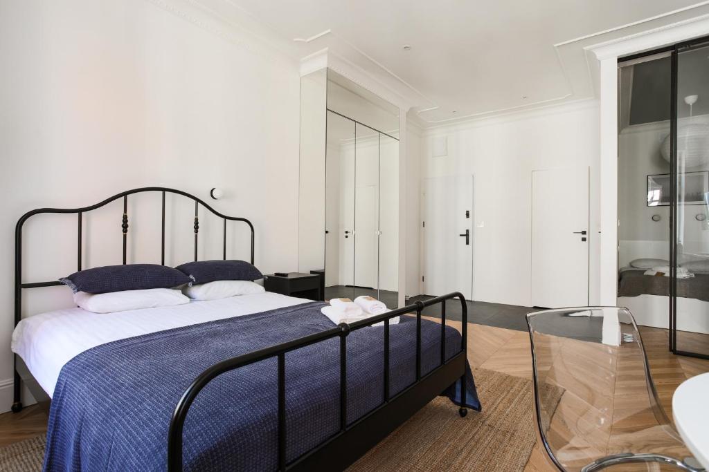 Posteľ alebo postele v izbe v ubytovaní Apartment Copernicus No. 25