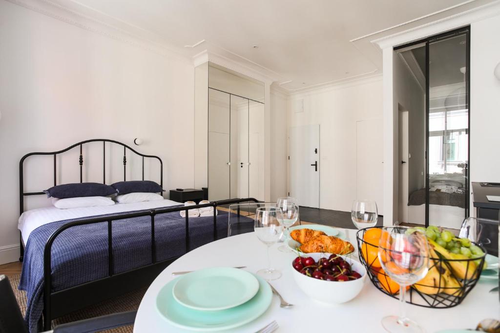 Posteľ alebo postele v izbe v ubytovaní Apartment Copernicus No. 25
