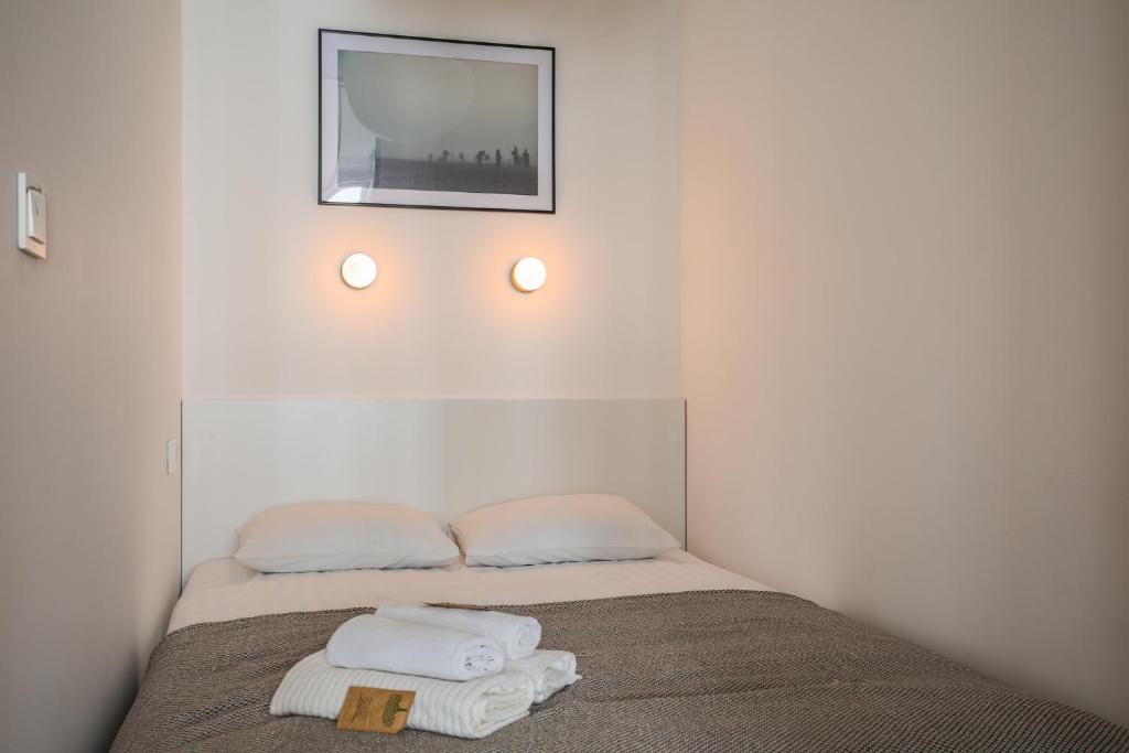 Posteľ alebo postele v izbe v ubytovaní Apartment Copernicus No. 25