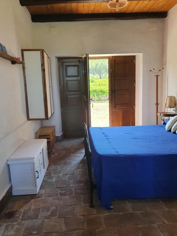 Postel nebo postele na pokoji v ubytování Suite in vigneto