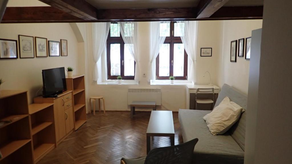 TV a/nebo společenská místnost v ubytování Apartment Jackie