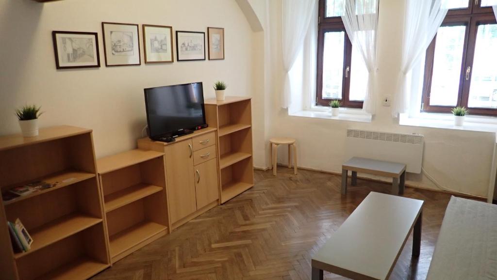 TV a/nebo společenská místnost v ubytování Apartment Jackie