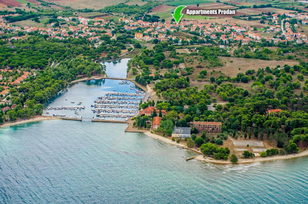 an aerial view of a lake with a bunch of boats at Apartments Prodan in Fažana