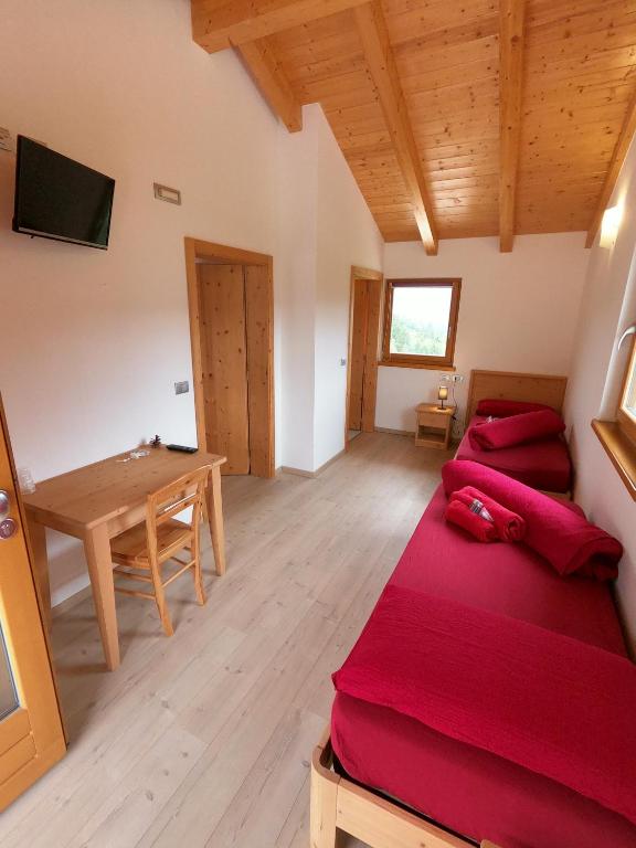 TV a/nebo společenská místnost v ubytování Agritur Fiore