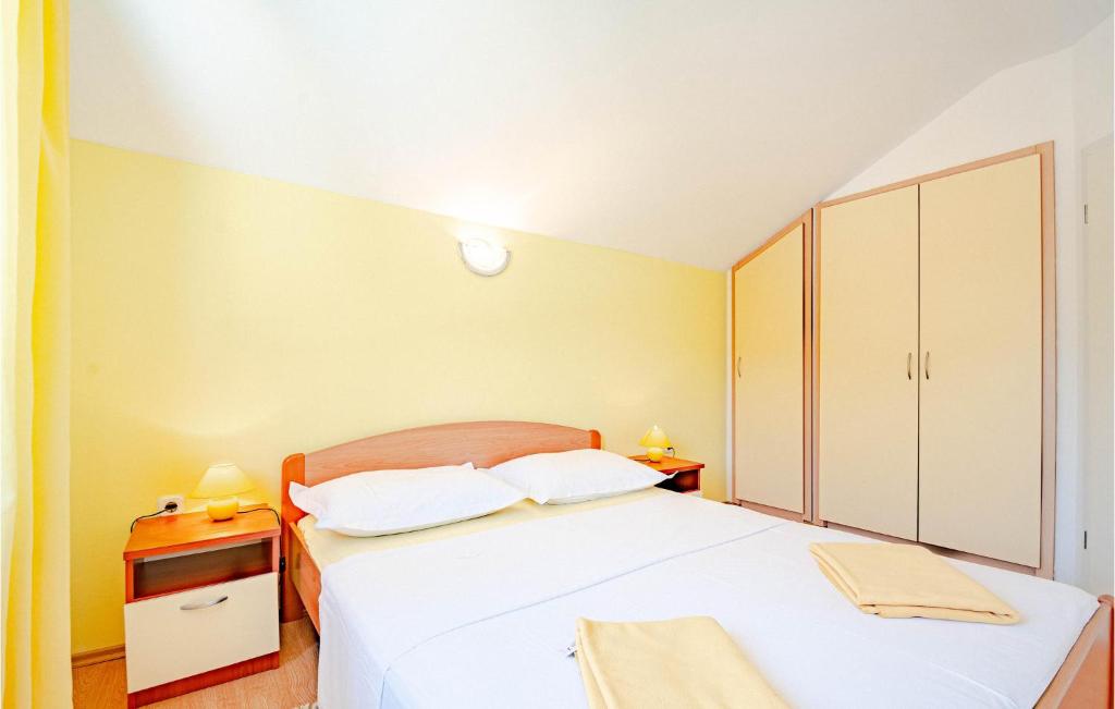Posteľ alebo postele v izbe v ubytovaní Holiday Home Ston 1