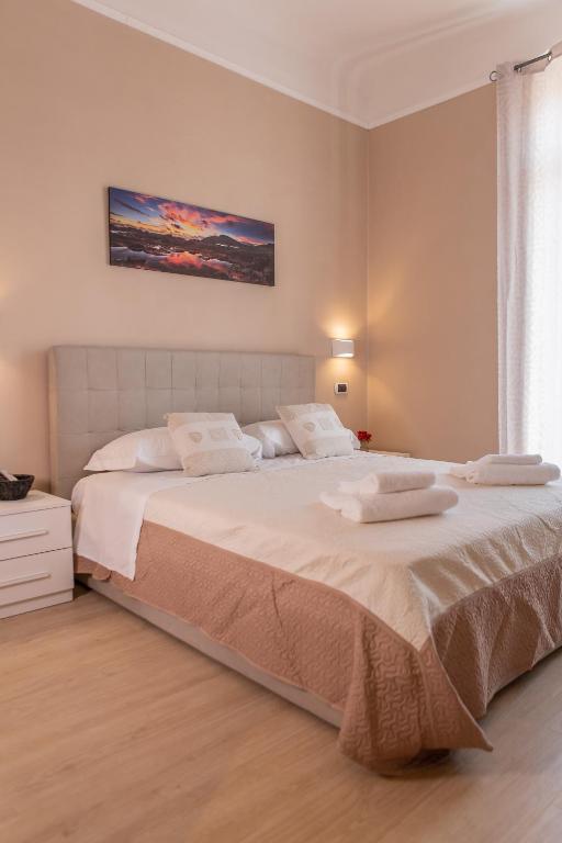Postel nebo postele na pokoji v ubytování Le Camere di Teo 2