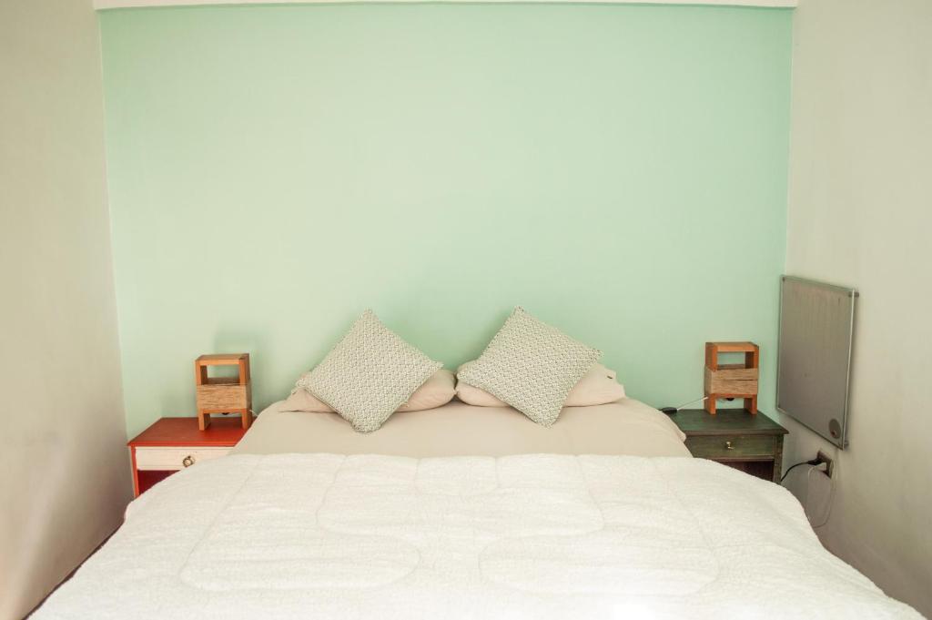 Postel nebo postele na pokoji v ubytování Eco-Hostal Tambo Verde