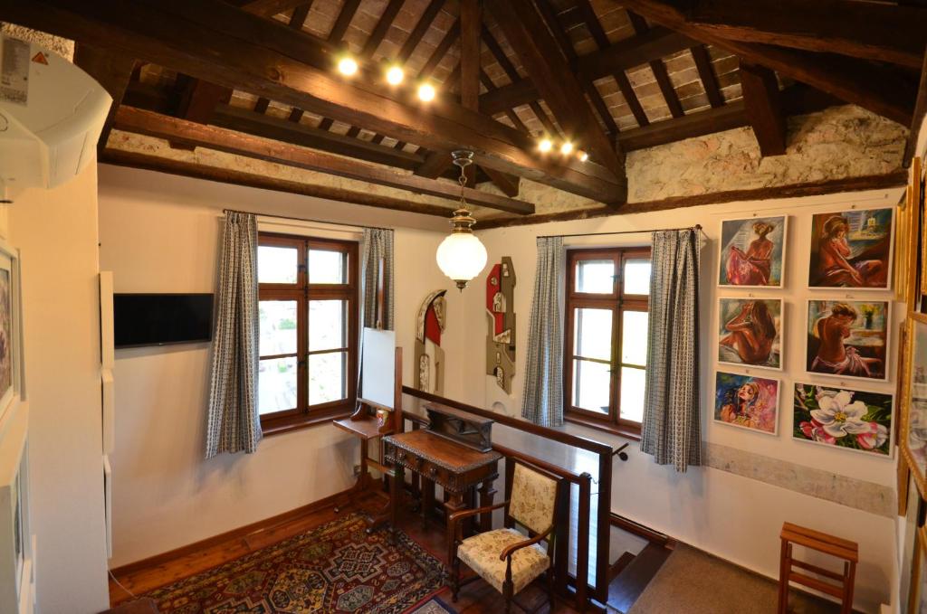 TV a/nebo společenská místnost v ubytování Al Castello di Aiello