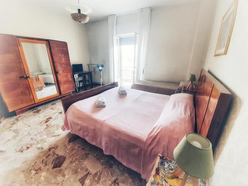 Postel nebo postele na pokoji v ubytování ççç Matera Short Term Rooms ççç