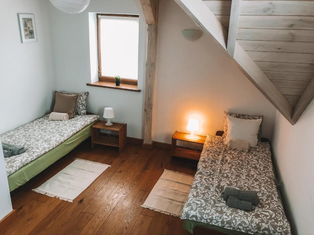 Voodi või voodid majutusasutuse Siedlisko na Wzgórzu toas